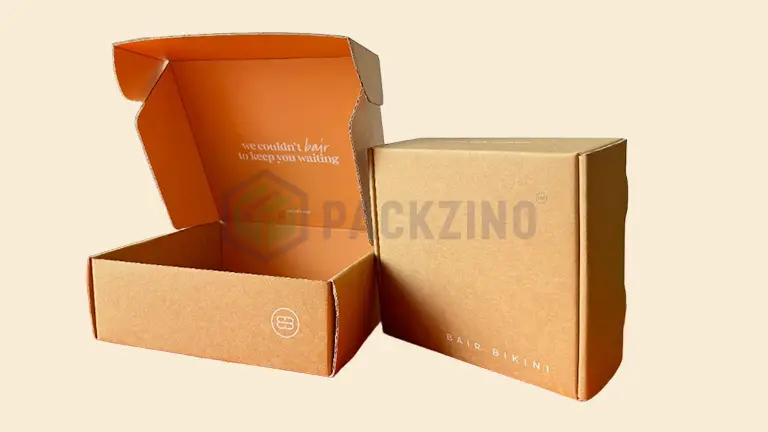 Custom brown corrugated mailer box with printed branding and interior design