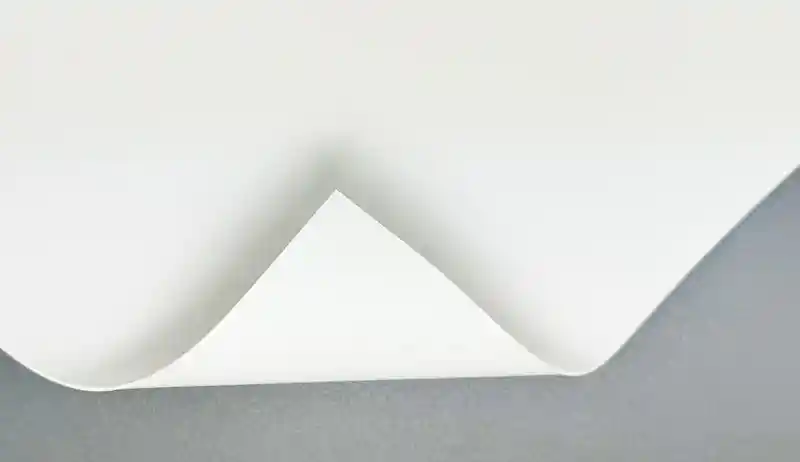 Coated one side paper with glossy top layer used in retail packaging