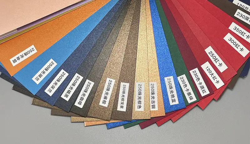 A set of pearl paper color cards with texture and labels in Chinese