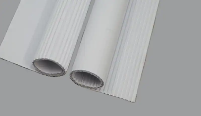 Rolled white B flute paper with visible corrugation structure