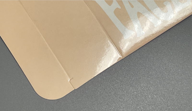 A light beige printed box with glossy water-based coating finish.