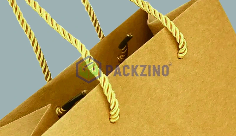 Kraft paper bag with thick yellow twisted paper cord handles