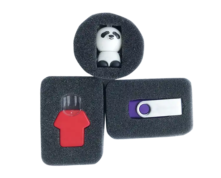 Custom foam packaging insert securely holds a USB flash drive in place.