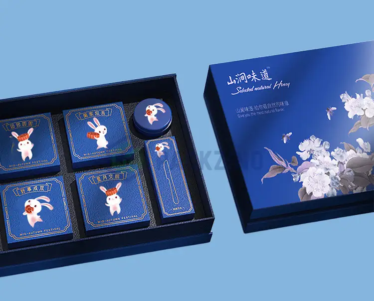 Custom rigid gift box with multi-cavity insert designed for festive treats and shipping stability.