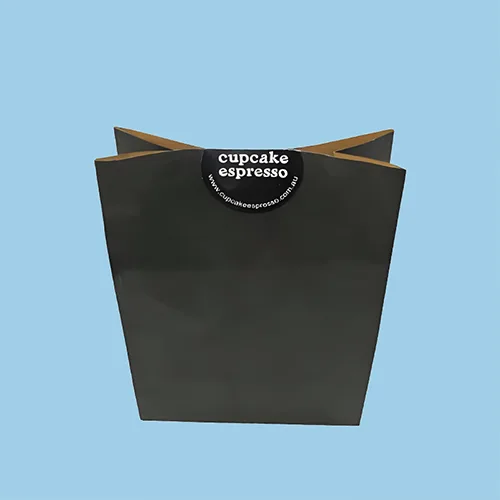 Bakery kraft paper bag with fold-top closure, perfect for takeaway packaging.