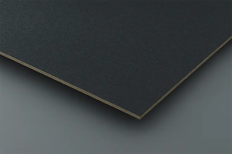 Black chipboard sheet commonly used for high-end rigid box packaging.