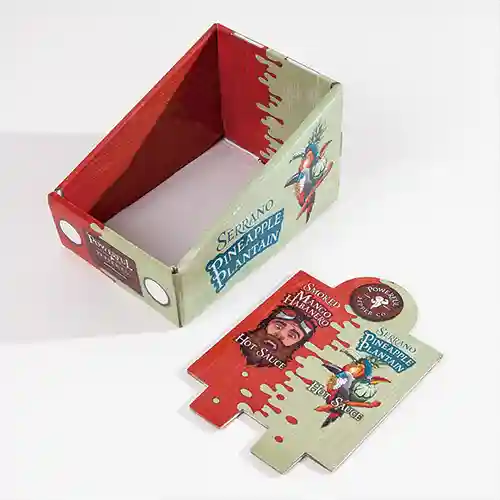 Corrugated counter display box for hot sauce retail product promotion.