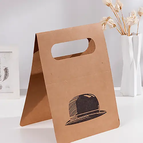 Kraft paper box with cut-out handle and minimalist hat design
