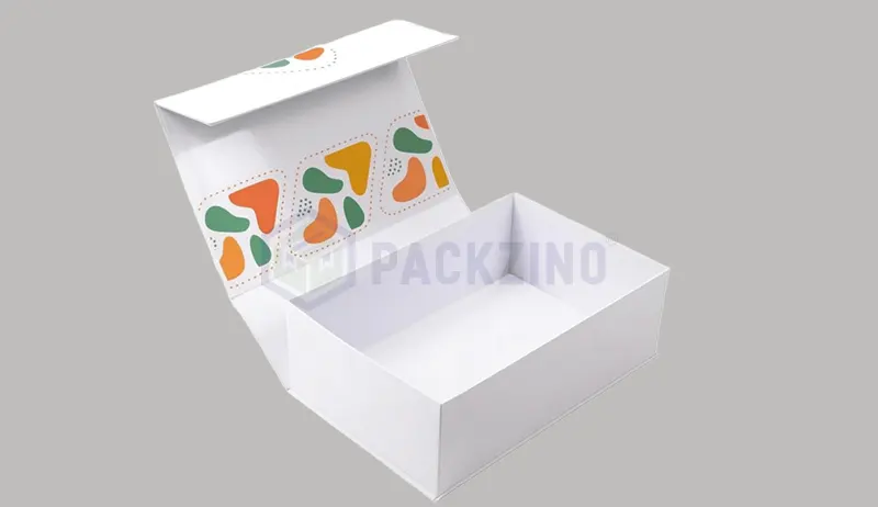 Flip top rigid box with magnetic closure and printed inner flap.