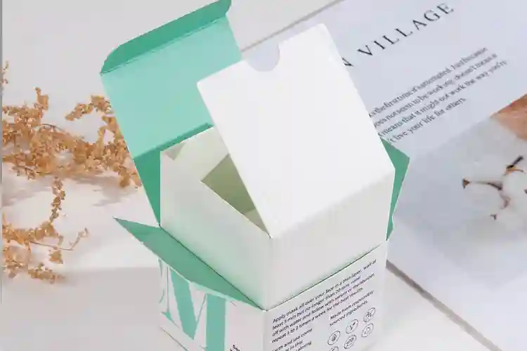 Low MOQ skincare packaging box with inner tray and dual-opening flaps for small batch cosmetics.