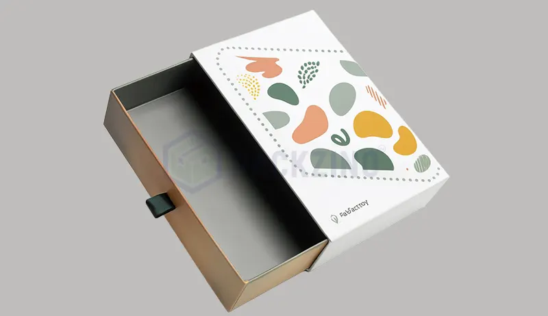 Drawer-style rigid box with ribbon pull tab and full lid cover.