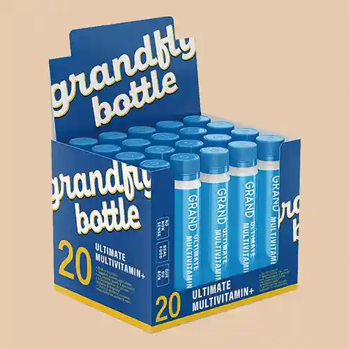 Retail display packaging for multivitamin tubes with bold branding.
