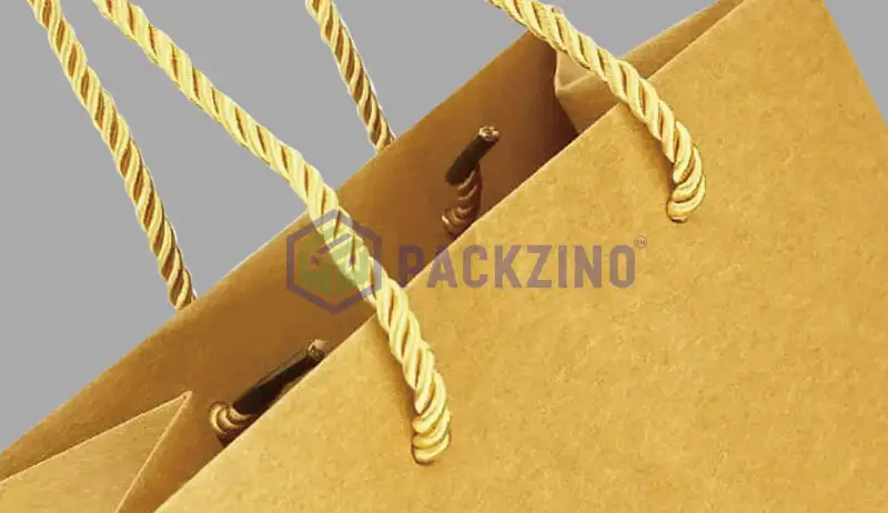 Kraft bag with thick yellow twisted handle with black ending