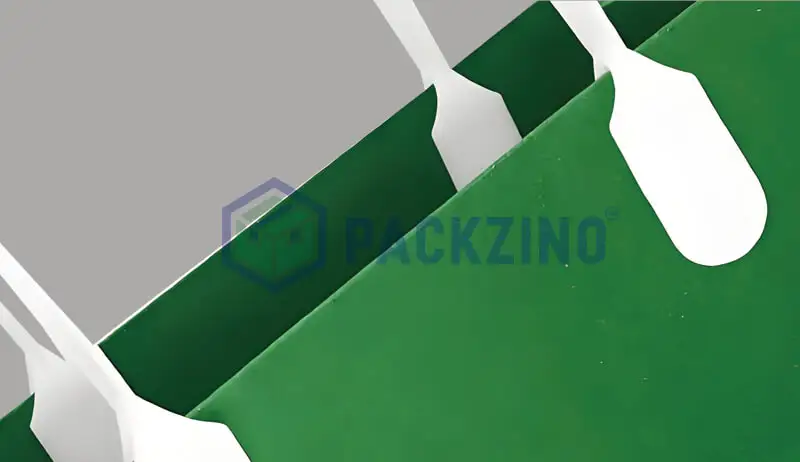 Green paper bag with embedded white flat plastic handles