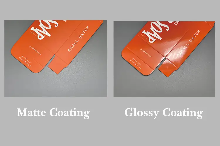 Side-by-side comparison of folding cartons with matte coating and glossy coating, showing surface texture and finish differences.