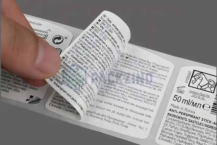 Eco-friendly label materials displayed together, showing paper, film, and multi-layer labels to demonstrate how sustainable label construction works in real production.