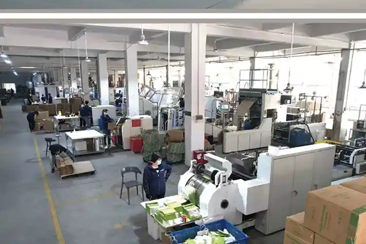 Flat handle paper bag manufacturing process on automatic machine line at Packzino.