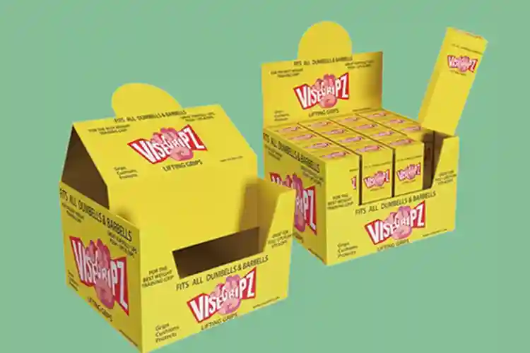 A yellow corrugated retail display box with multiple product slots, showcasing custom printed design for retail presentation.